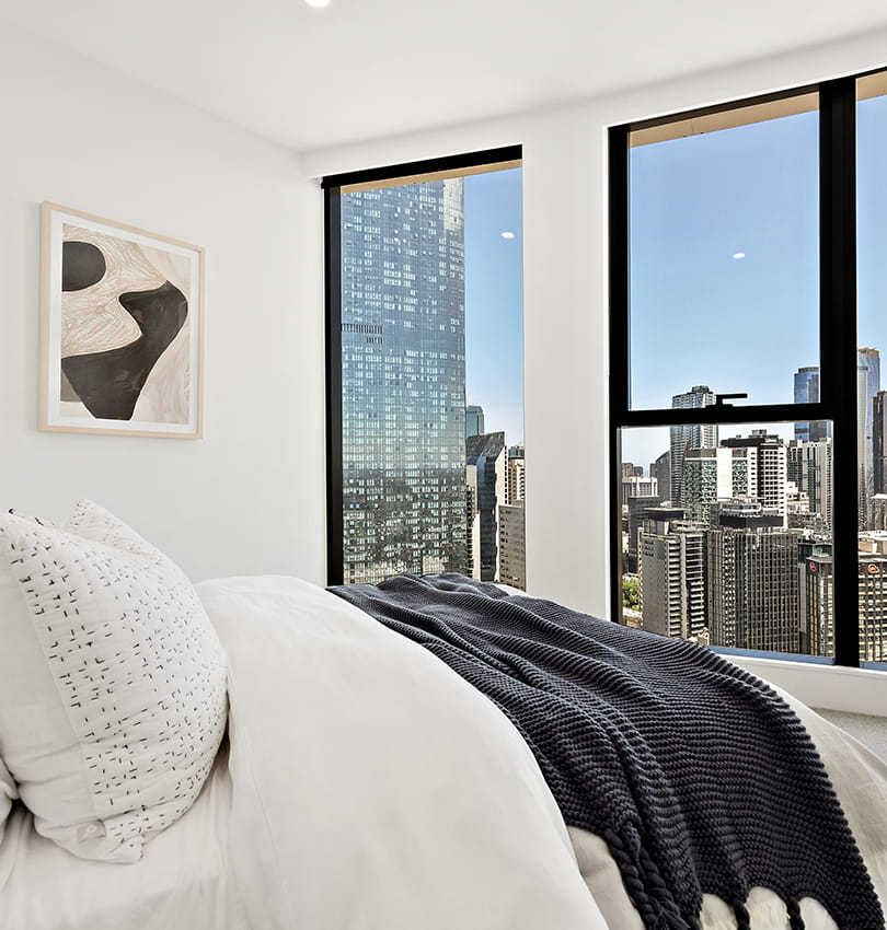 A view of Melbourne CBD from a bedroom apartment at LIV Munro