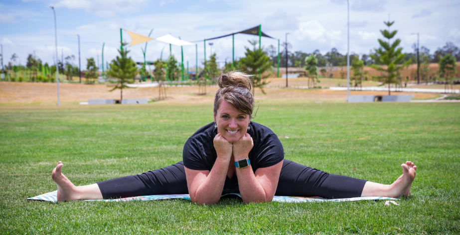 Woman doing splits in Everleigh Park space