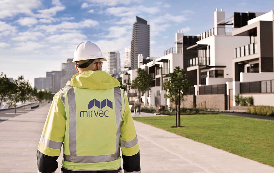 Mirvac construction worker walking at Yarra's Edge