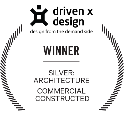 driven x design commercial constructed architecture award logo