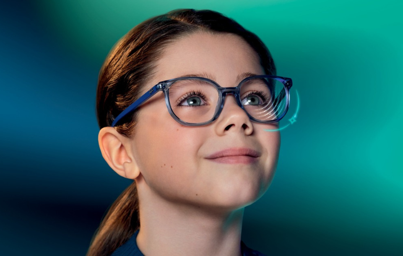 OPSM 25% Off lenes and extra - female wearing red glasses.