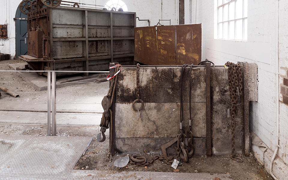 Examples of wire and chain crane slings used to move metal billets around the Davy Press space.