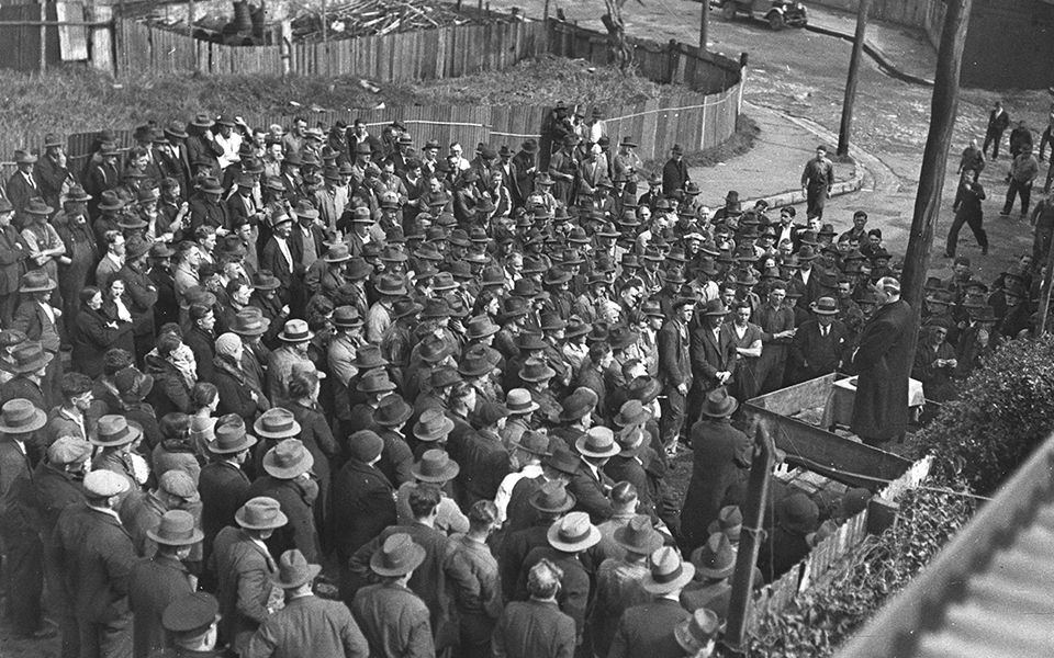Mass rally of Eveleigh railway workers listens to an election speech from Jack Lang