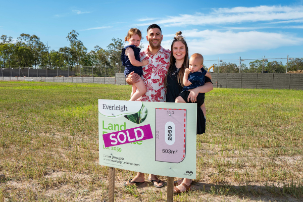 Everleigh residents with lot sign